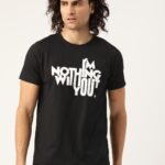 Man wearing a "I'm Nothing Without You" Hinglish graphic t-shirt from HinglishWear.com, standing next to a friend/family member.