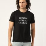 A close-up of a HinglishWear t-shirt with the text "design is design" printed on it. Title