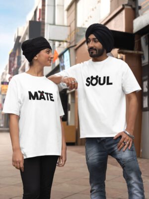 A South Asian couple wearing HinglishWear t-shirts. The girl's shirt reads "Mate" and the boy's shirt reads "Soul," combining to form "Soulmate" when standing together.